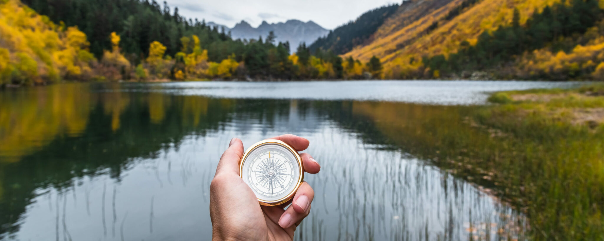 First-person,View,Of,A,Female,Hand,With,A,Compass,On